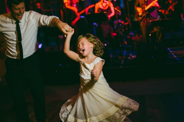 flower girl dancing and laughing